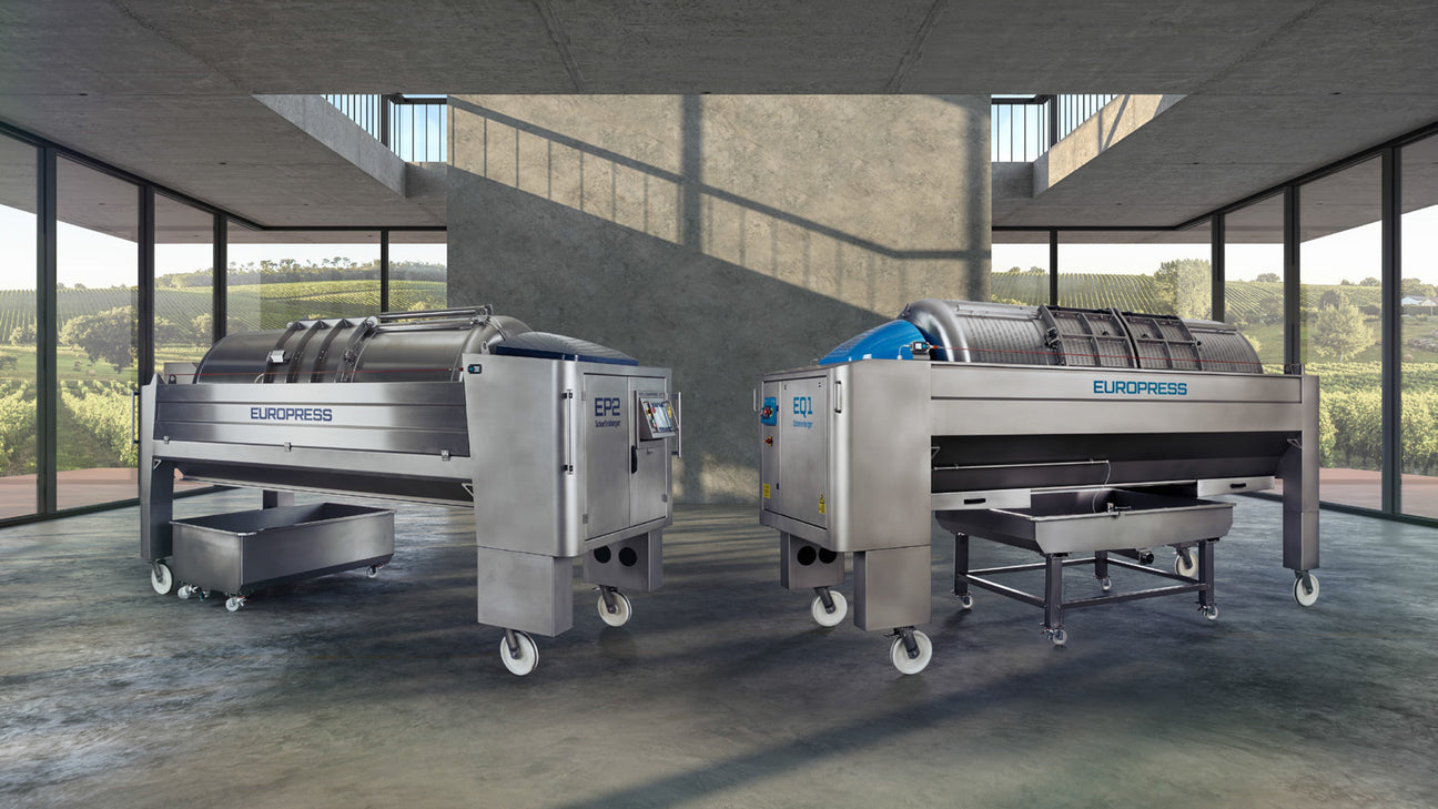Winegrape crushpad equipment including destemmers and pneumatic presses